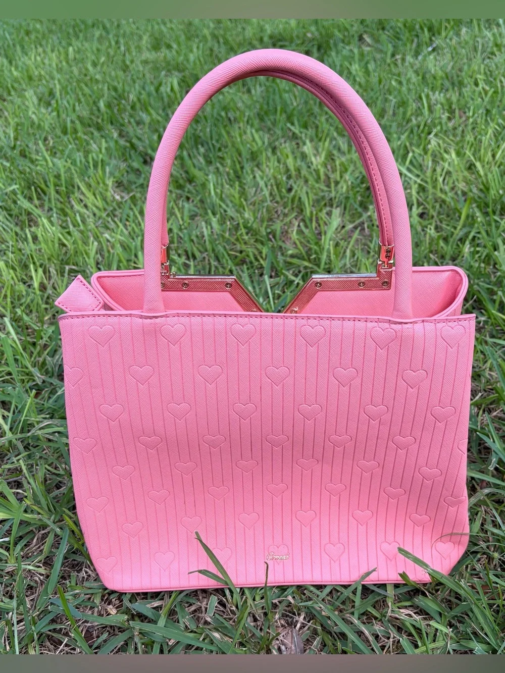 Crossi Pink Structured Heart-Embossed Tote Bag with Tassel Charm